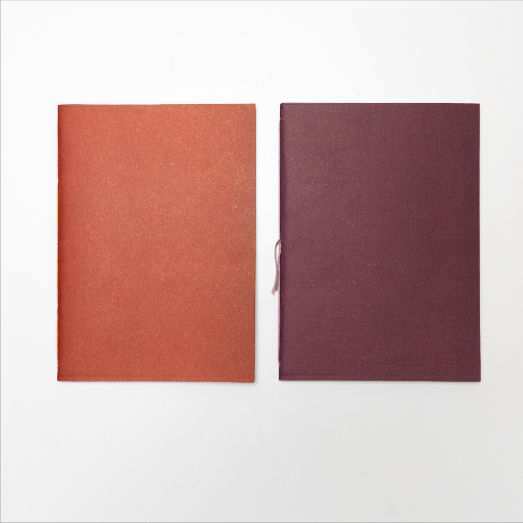 Pack de 2 libretas A5 Fuego con interior rayado y liso, tonos cálidos, Nómade Editorial
